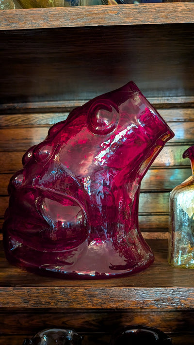 Blenko No. 7921 frog vase in ruby glass on a wooden shelf