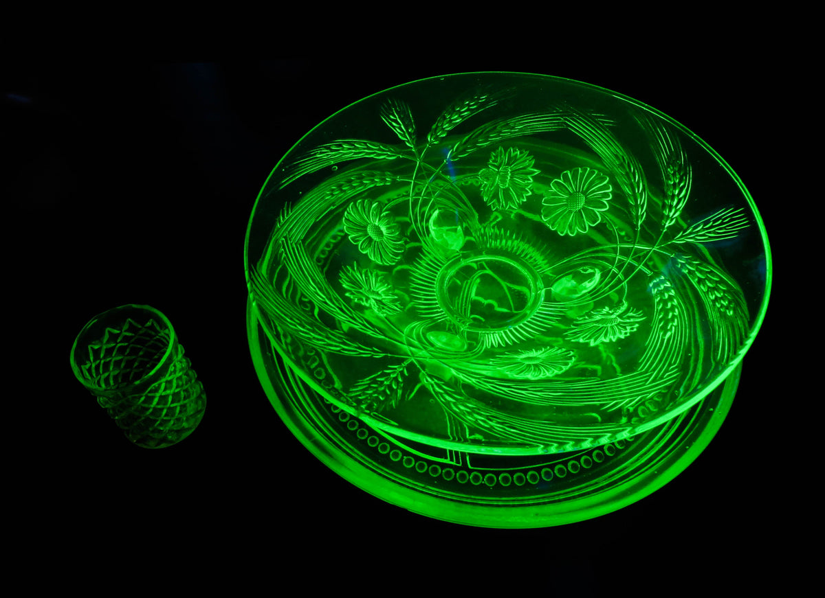 Transparent yellow-green uranium glass fluorescing bright green under ultraviolet light