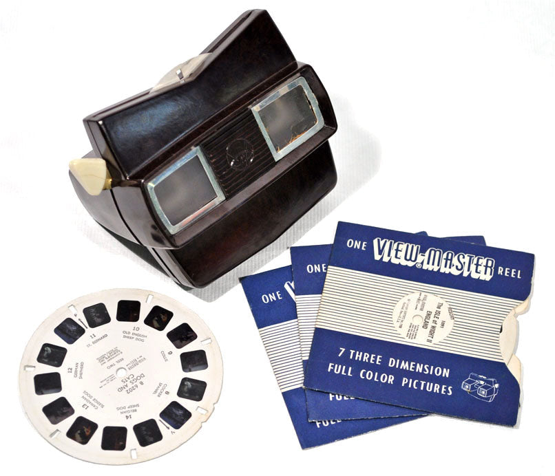 A vintage View-Master viewer with a reel loaded