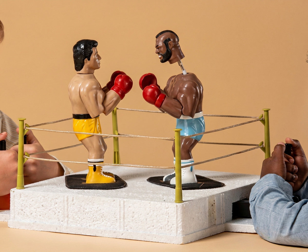 Rocky Rock 'em Sock 'em action playset by PAC Toys: Rocky Balboa and Clubber Lang in the ring, two children at the controls