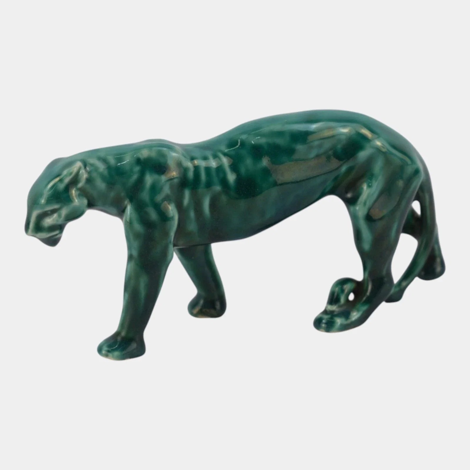Rookwood stalking panther paperweight, shape 2563, dated 1946, in a glossy green glaze