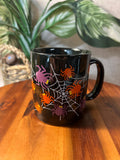 Halloween themed mug with spiders