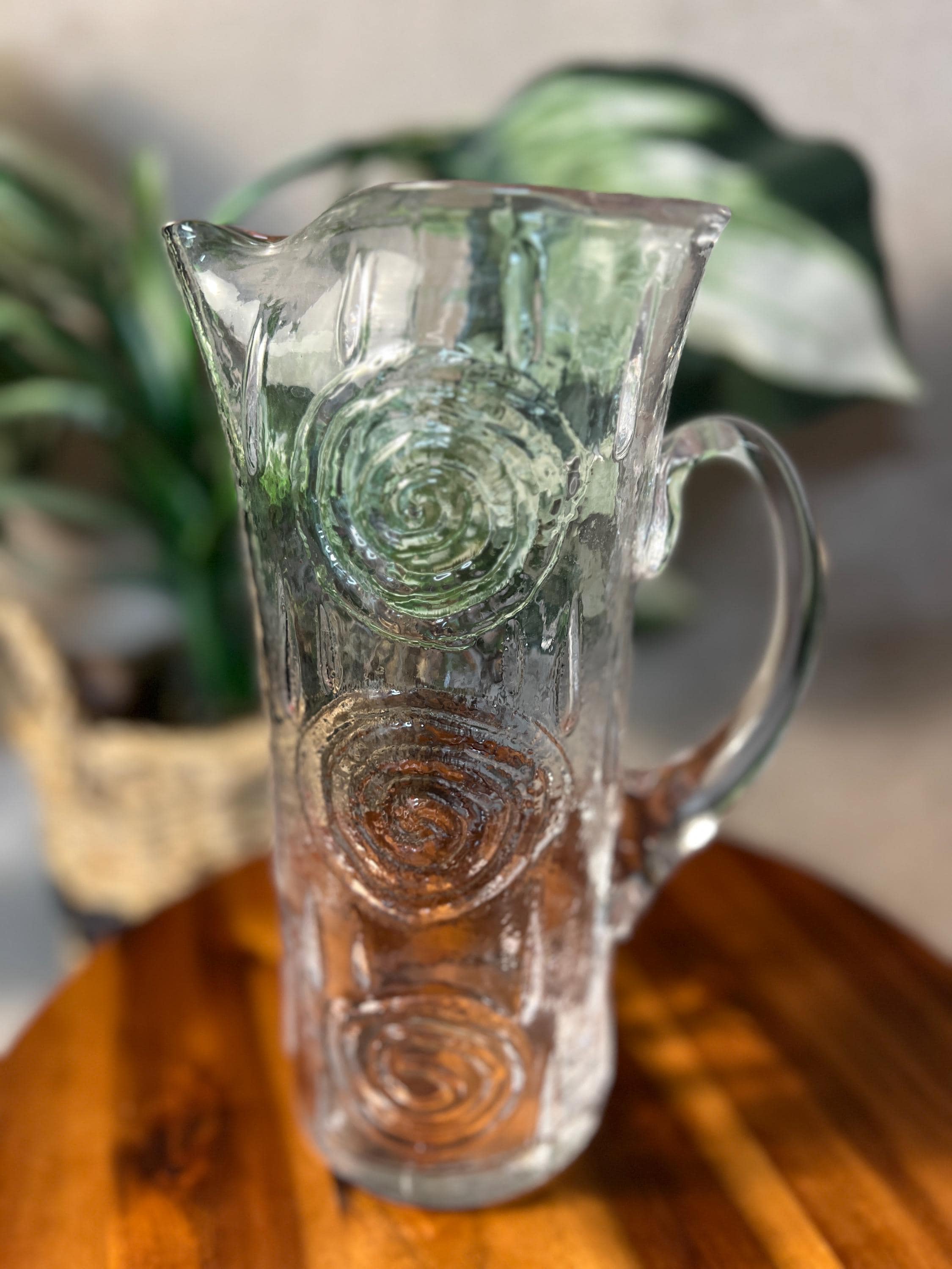 Swedish glass carafe from Björkshult is designed by Carl-Einar Borgström