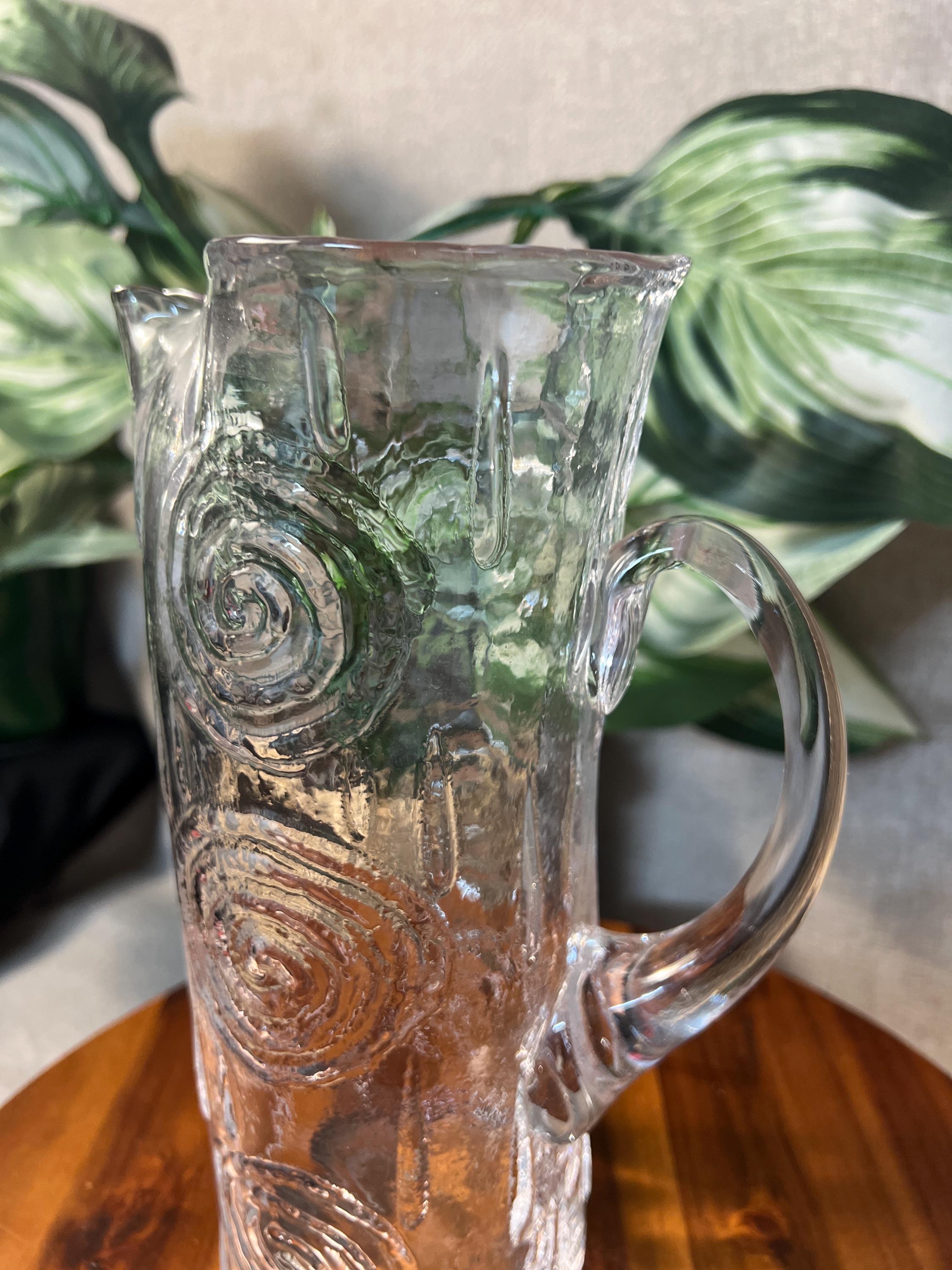 Swedish glass carafe from Björkshult is designed by Carl-Einar Borgström