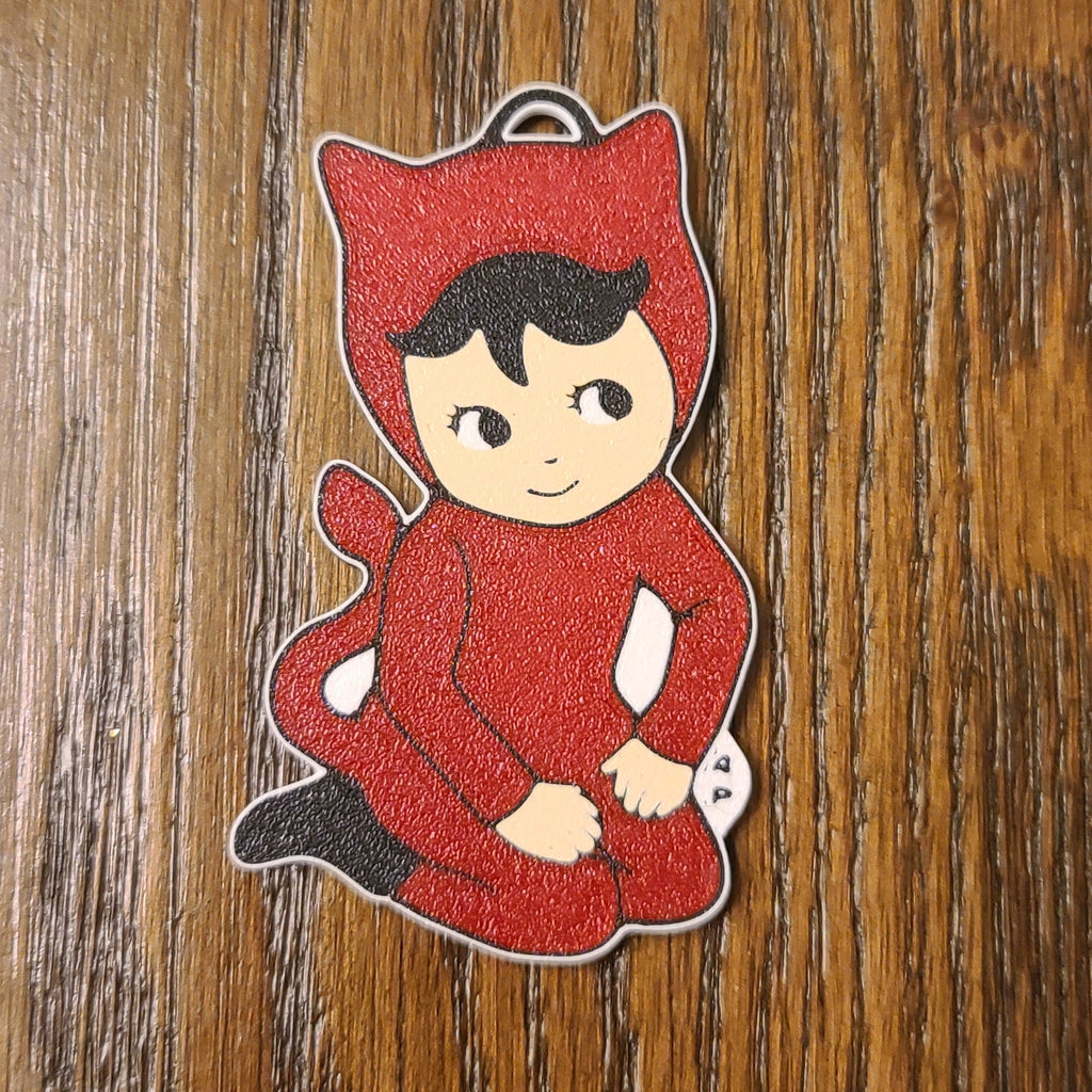 Devil baby keychain in red, 1950s ceramic kitsch style